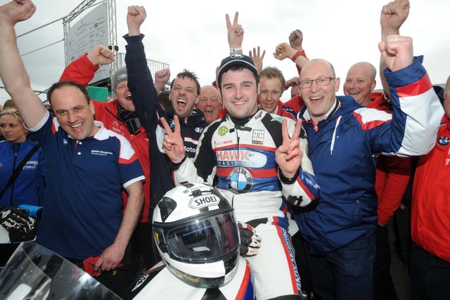 Michael Dunlop toasts victory in the feature NW200 Superbike race in 2014 to kick-start his new association with BMW Motorrad in style.