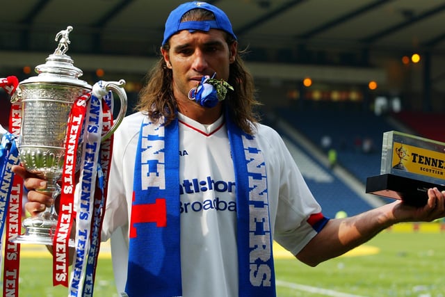 A centre-half I admired as a kid - I enjoyed watching the free-kicks and the long hair...Rangers Italian Stallion!