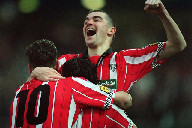 Sean Hargan and Gary Beckett celebrate Derry City's second goal against St Pat's at Brandywell.