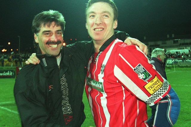 Derry City manager, Felix Healy pictured with striker and fellow 1989 treble winner, Liam Coyle after clinching the league title for a second time.