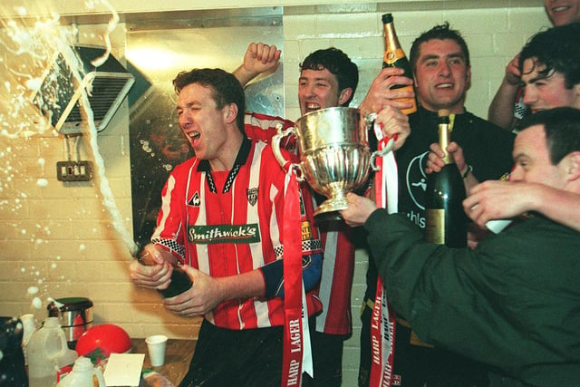 Liam Coyle leads the celebrations in the dressing room after Derry City were crowned league champions for a second time in April 1997.