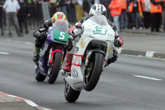 The race developed into a two-horse race between Michael Dunlop (3) and Christian Elkin as they battled all the way to the finish.