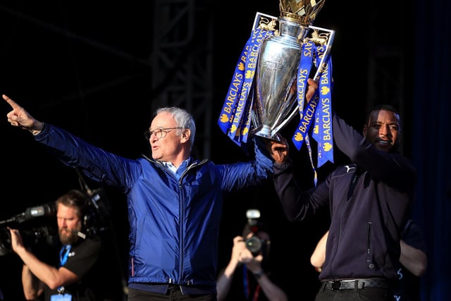 Leicester City manager Claudio Ranieri and captain Wes Morgan with the trophy on stage at Victoria Park after the open top bus parade through Leicester City Centre