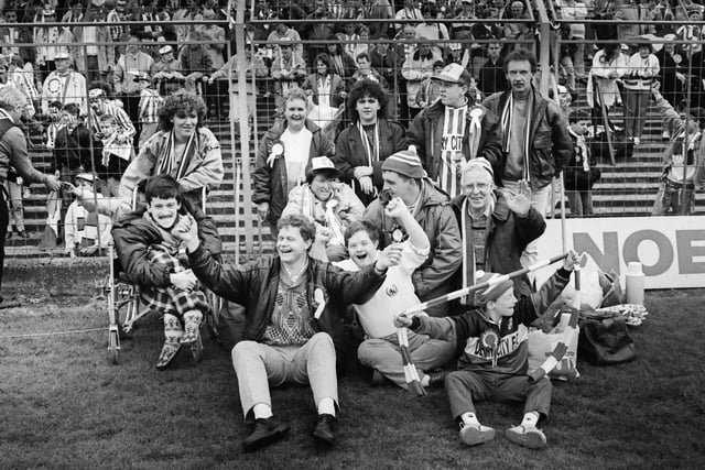 Derry City fans celebrate their team completing the historic treble in the 1988/89 campaign.
