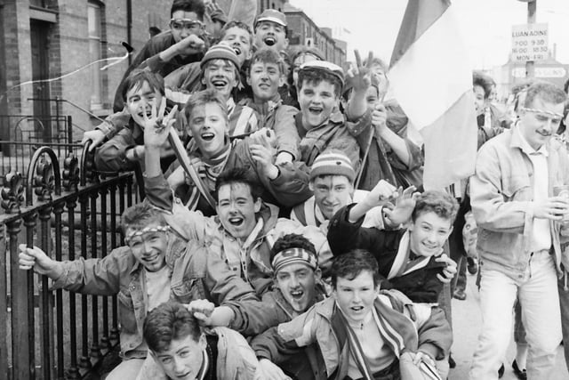 Derry City supporters celebrate after their team complete an historic treble in the 1988/89 season.