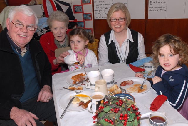 Mary Lou Richmond, principal at Bellaghy PS pictured with the Graham family as they enjoy the 'Breakfast with Santa' held at Bellaghy PS, last Saturday morning.mm4907-150ar.