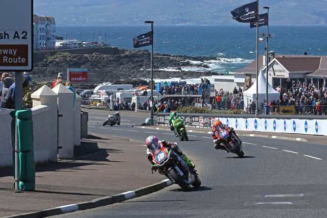 Malachi Mitchell-Thomas leads Jeremy McWilliams in the ill-fated Supertwin race at the 2016 North West 200.