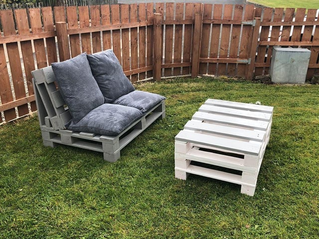 Jacqueline McColgan: "Our new patio set. Made out of pallets and everyone on the house helped paint them".