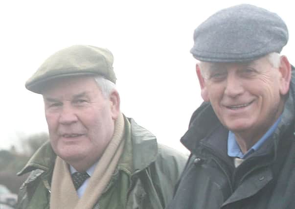 Tom McCracken and Willie King enjoy a chat during the Coleraine Ploughing Match on Monday.  Pic:  Steven McAuley / Kevin McAuley Photography.