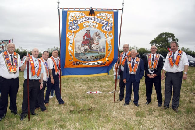 Members of Magaberry True Blues LOL 86

Hundreds of Orange men and women paraded in Aghalee for the South Antrim Combine demonstration.  Seven districts took place with around 30 bands present.