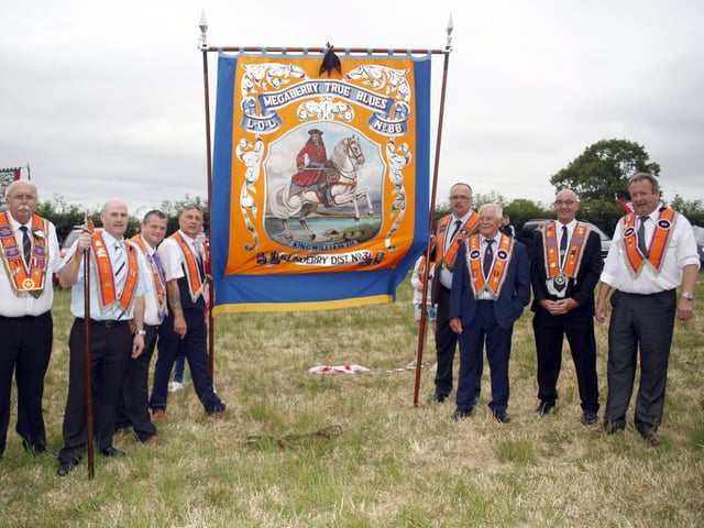 Members of Magaberry True Blues LOL 86Hundreds of Orange men and women paraded in Aghalee for the South Antrim Combine demonstration.  Seven districts took place with around 30 bands present.