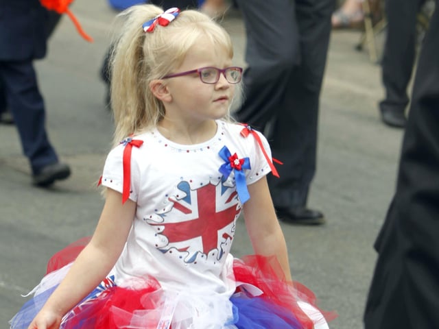 Tutu fun as a young girl parades with LOL Quarter Volunteers, LOL 187
Hundreds of Orange men and women paraded in Aghalee for the South Antrim Combine demonstration. Seven districts took place with around 30 bands present.