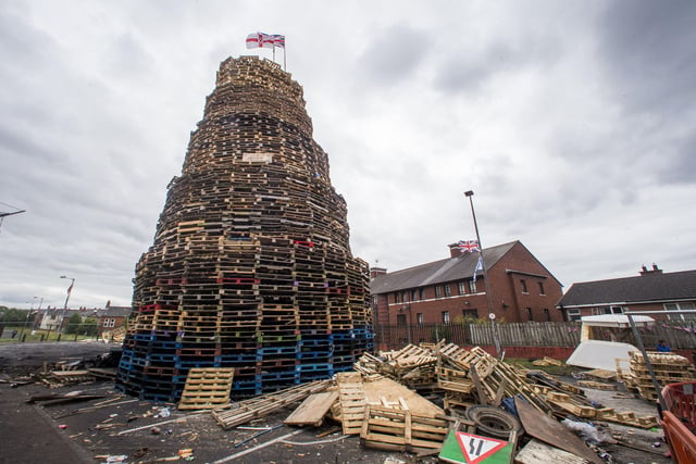 A loyalist bonfire at Bloomfield Walkway in Belfast. Police in Northern Ireland have warned their resources could be stretched amid growing fears of tension around the burning of Eleventh night bonfires