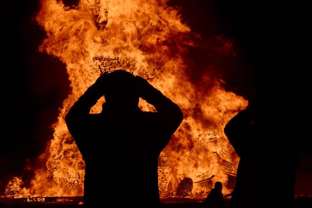 People pictured enjoying the  Kilcooley bonfire in Bangor  Co Down, Northern Ireland