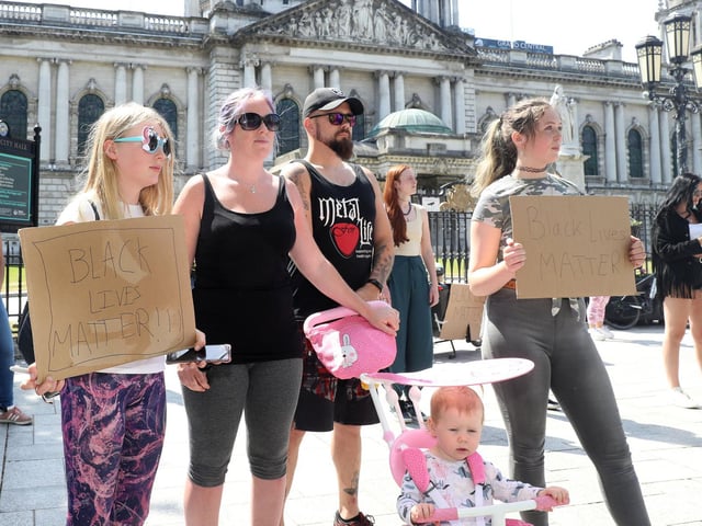 Friends pictured at the rally outside Belfast City Hall.
