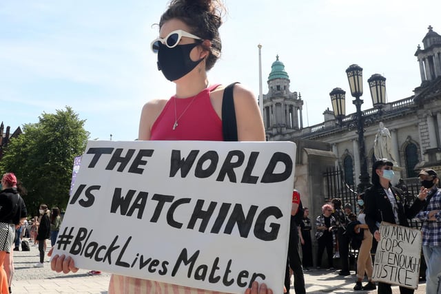 'The world is watching' was just one of the banners at the Black Lives Matter solidarity rally in Belfast on Monday afternoon.