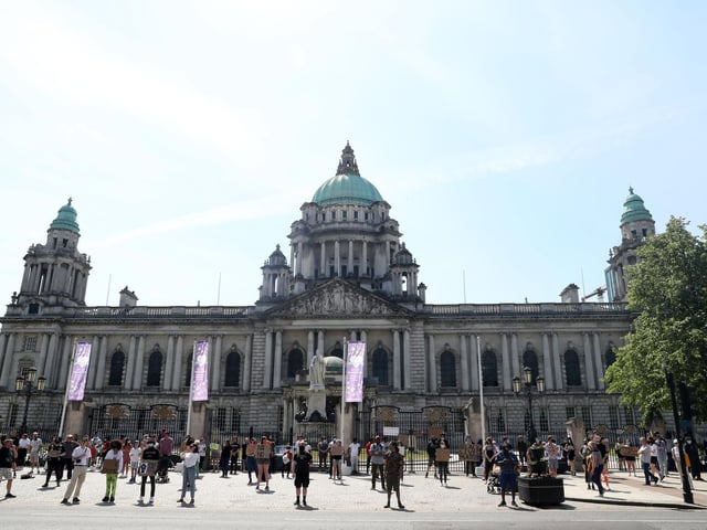 People gather for the rally outside Belfast City Hall.