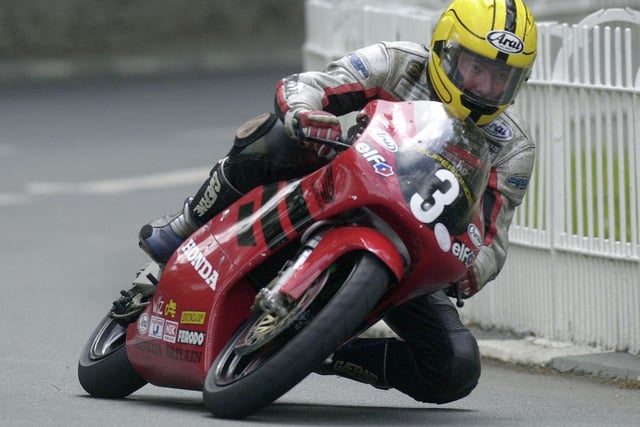 Joey Dunlop on his way to victory in the Ultra-Lightweight race at the 2000 Isle of Man TT - his 26th and final ever win at the event.