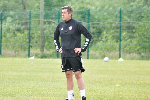 Derry City manager, Declan Devine watches over the various small sided training groups at at Aileach FC in Burnfoot