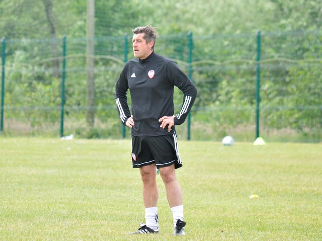 Derry City manager, Declan Devine watches over the various small sided training groups at at Aileach FC in Burnfoot