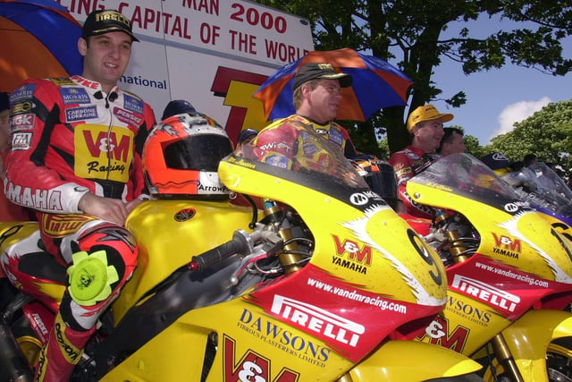 Senior TT winner David Jefferies (centre) with runner-up Michael Rutter (left) and Joey Dunlop after the race in 2000.