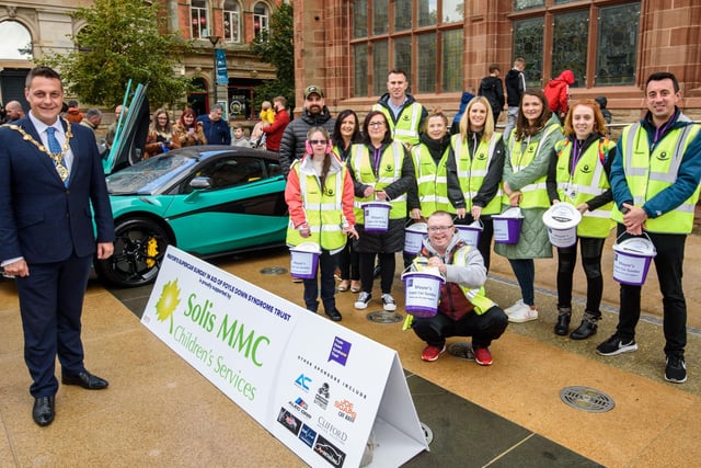 The Mayor Alderman Graham Warke and members of Foyle Down Syndrome Trust with Andy Allen from A+ Detailing, one of the sponsors, during Super Car Sunday in aid of the Mayorâ€TMs Charity Appeal for Foyle Down Syndrome Trust. Picture Martin McKeown. 03.10.21