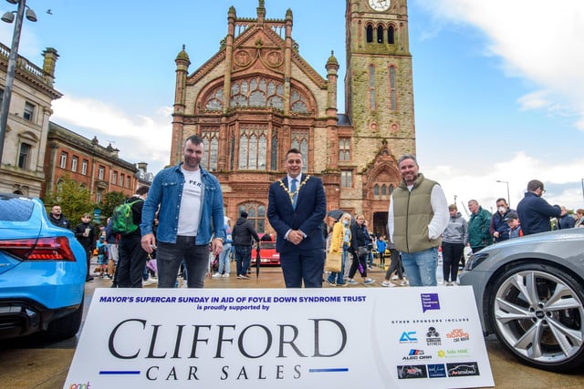 Event organisers, Keith Gamble and Gary McCaul with te Mayor Alderman Graham Warke during Super Car Sunday in aid of the Mayorâ€TMs Charity Appeal for Foyle Down Syndrome Trust. Picture Martin McKeown. 03.10.21
