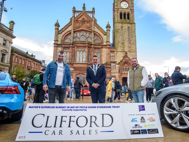 Event organisers, Keith Gamble and Gary McCaul with te Mayor Alderman Graham Warke during Super Car Sunday in aid of the Mayorâ€TMs Charity Appeal for Foyle Down Syndrome Trust. Picture Martin McKeown. 03.10.21