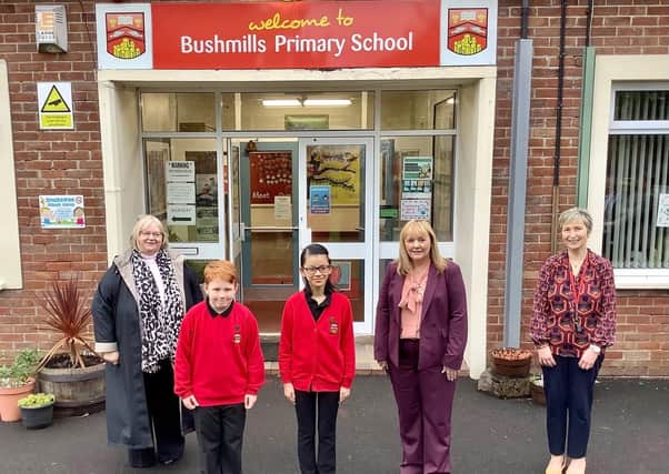 (l to r) Rev Dr N Cubitt (Board of Governors’ Chairperson), pupils, Education Minister Michelle McIlveen and Miss J Logan (Principal)