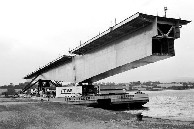 1982... A section of the new Foyle Bridge arrives at Lisahally. Built at Harland and Wolff shipyard in Belfast, it was brought to Derry by barge.
