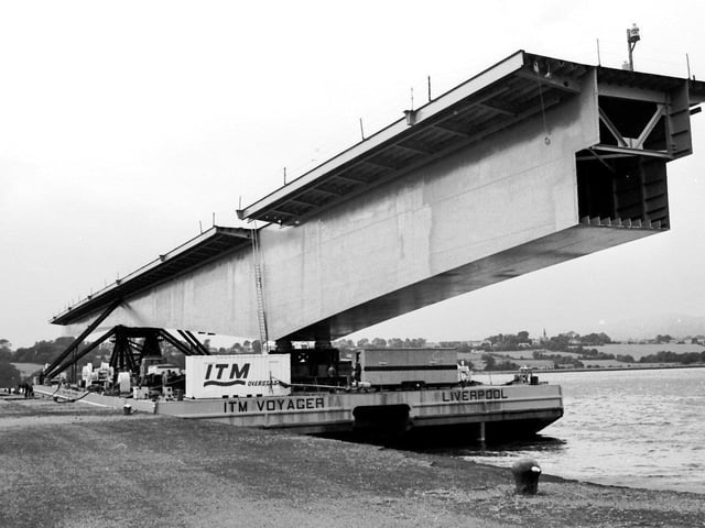 1982... A section of the new Foyle Bridge arrives at Lisahally. Built at Harland and Wolff shipyard in Belfast, it was brought to Derry by barge.