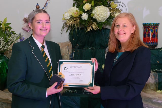 Demi-Leigh Duffy receives the GCSE Subject Award for Art & Textile from Martine Mulhern, Principal of St Cecilia’s College, at the KS4 Awards presentation on Thursday afternoon last in the school. DER2141GS – 034