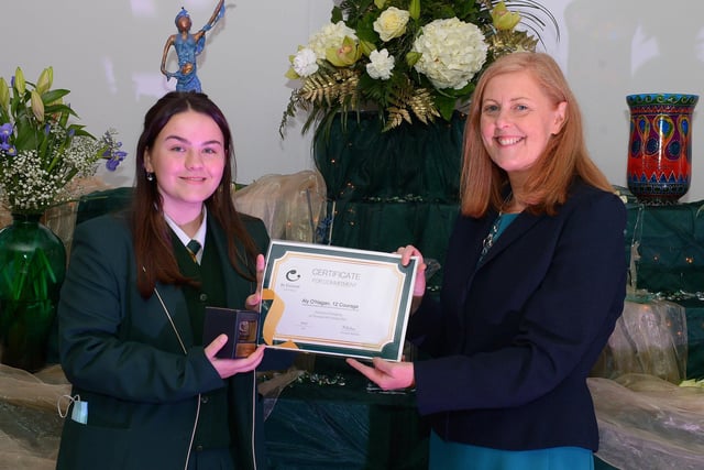 Aly O’Hagan receives the Courage Commitment Award from Martine Mulhern, Principal of St Cecilia’s College, at the KS4 Awards presentation on Thursday afternoon last in the school. DER2141GS – 033
