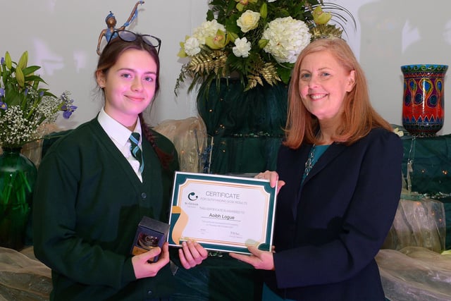 Aoibh Logue receives a Top GCSE Award from Martine Mulhern, Principal of St Cecilia’s College, at the KS4 Awards presentation on Thursday afternoon last in the school. DER2141GS – 038