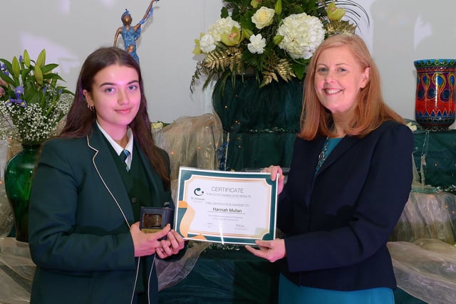 Hannah Mullan receives a Top GCSE Award from Martine Mulhern, Principal of St Cecilia’s College, at the KS4 Awards presentation on Thursday afternoon last in the school. DER2141GS – 039