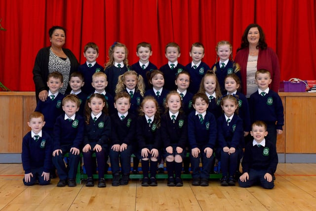 Mrs McGowan (on the right), teacher, and Mrs Cairns, classroom assistant, with their P1 class at St Patrick’s Primary School. DER2140GS – 020