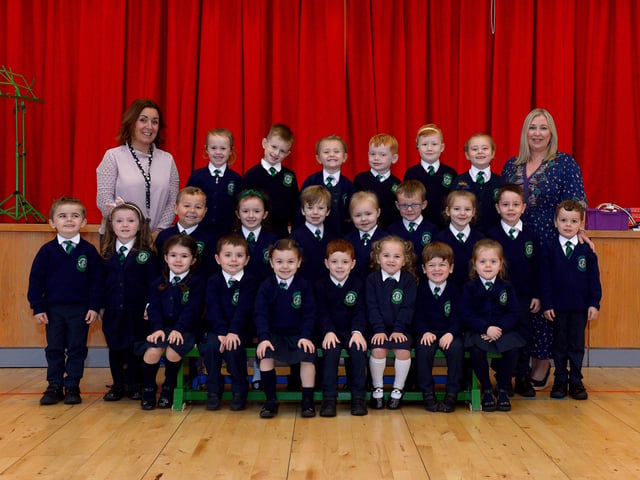 Mrs Hanley (on the right), teacher, and Ms McKee, classroom assistant, with their P1 class at St Patrick’s Primary School. DER2140GS – 021