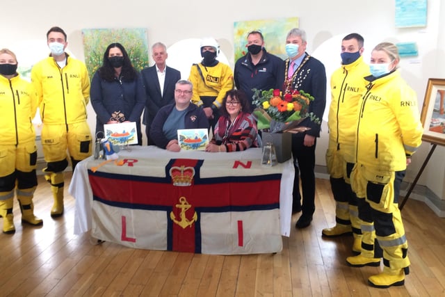 Pictured at the launch of Dee the Little Lifeboat are (front) author Dr Martin O'Kane and illustrator Alice Rohdich. Included in the back row are crew members, MLA Claire Sugden, compere Brian Moore, Lifeboat Operations Manager Beni McAllister and Mayor of Causeway Coast and Glens, Cllr Richard Holmes