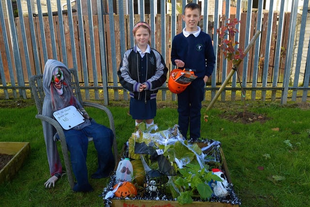 Bunscoil Cholmcille pupils Kyra and James Duffy pictured at their prize winning Halloween plant bed at the school’s Halloween plant beds competition on Monday afternoon last. DER2143GS – 040