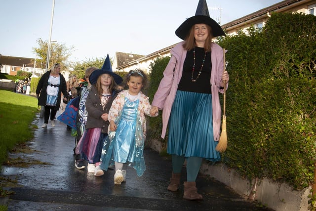 Dressed up for Halloween - P1 pupils from Greenhaw making their way around Carnhill on Friday morning last.