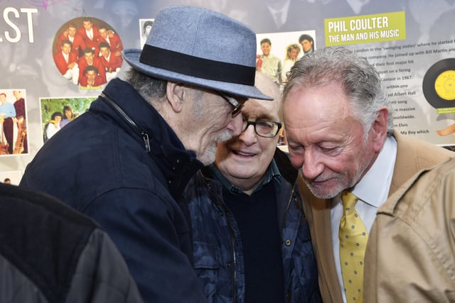 Phil Coulter pictured deep in conversation with Gay McIntyre and Frankie Robinson at the opening of a Showbands of the North West exhibition in the Garden of Reflection.