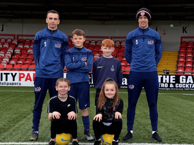 Boys and girls pictured with coaches Paul McLaughlin and Ciaron Harkin at the recent Ryan McBride Halloween Camp held at Brandywell Stadium.