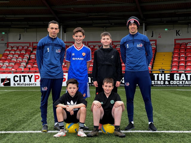 Young footballers pictured with coaches Paul McLaughlin and Ciaron Harkin at the recent Ryan McBride Halloween Camp held at Brandywell Stadium.