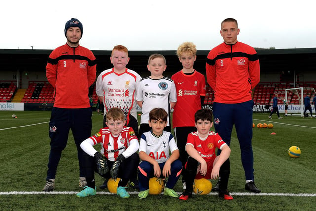Coaches Paul McLaughlin and Jack Malone pictured with young soccer players at the recent Ryan McBride Halloween Camp held at Brandywell