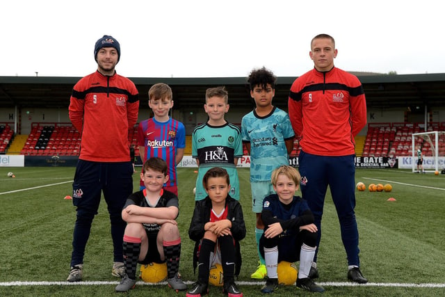 Coaches Paul McLaughlin and Jack Malone pictured with young soccer players at the recent Ryan McBride Halloween Camp held at Brandywell