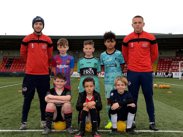Coaches Paul McLaughlin and Jack Malone pictured with young soccer players at the recent Ryan McBride Halloween Camp held at Brandywell