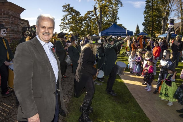 Councillor Thomas Beckett, Leisure & Community Development Vice-Chair with the Zombie Samba Band who were entertaining the Halloween Hoolie guests.