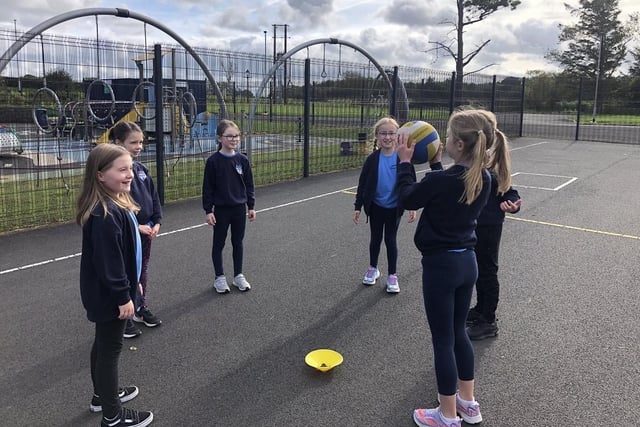 Pupils from Carnalridge Primary School enjoy some Heritage Games in the playground organized by Causeway Coast and Glens Borough Council as part of its NI 100 programme.