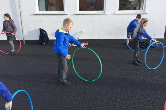 Pupils from Macosquin Primary School enjoy a hula-hoop activity as part of the Heritage Games organized by Causeway Coast and Glens Borough Council