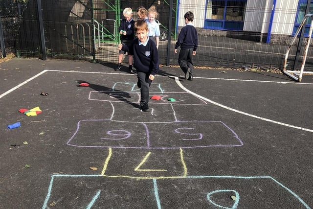 Enjoying a game of hopscotch during the Heritage Games at Carnalridge Primary School, Portrush
